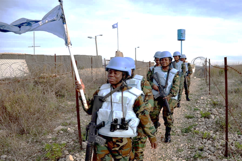 Ghanaian women peacekeepers carry out foot patrol along the 23-km stretch of the Blue Line, which is essential to maintain the existing calm in the area.