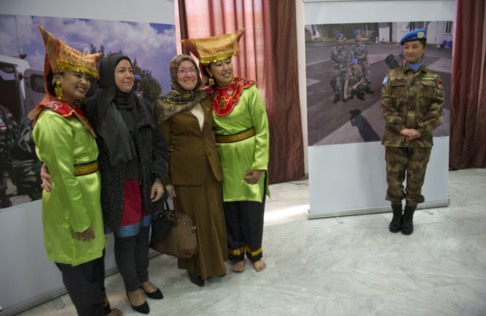 UNIFIL Indonesian Peacekeepers wearing their traditional costumes at a photo exhibition organized by UNIFIL to celebrate International Women’s Day held at Tyr’s Cultural centre