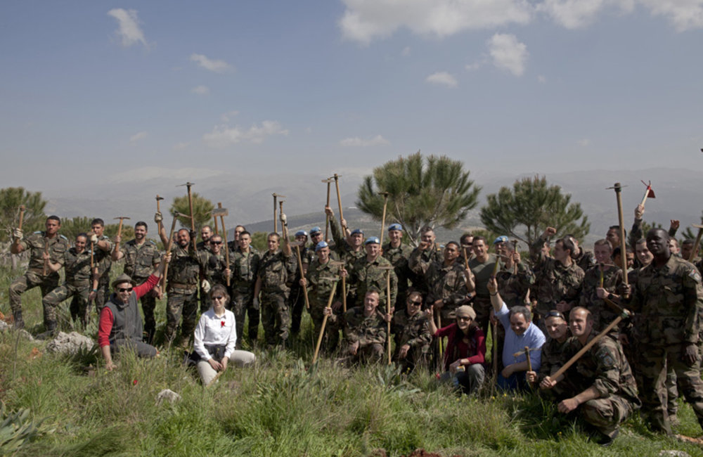 UNIFIL peacekeepers and members of the Lebanese NGO Jouzour Loubnen during a reforestation campaign in Ebel es Saqi