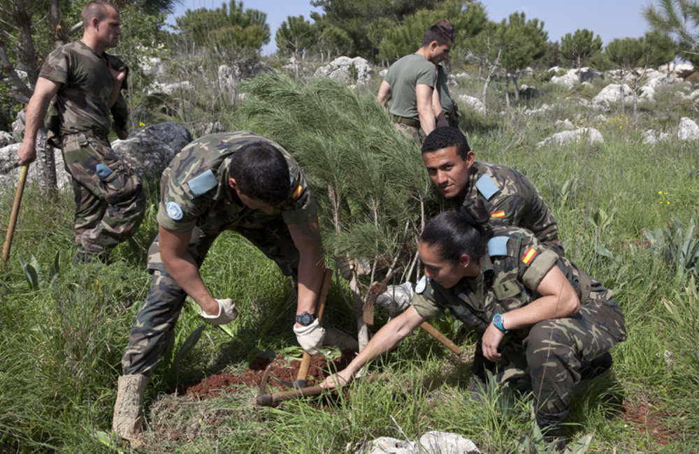 UNIFIL Spanish peacekeepers planting a tree during a reforestation campaign in Ebl es Saki