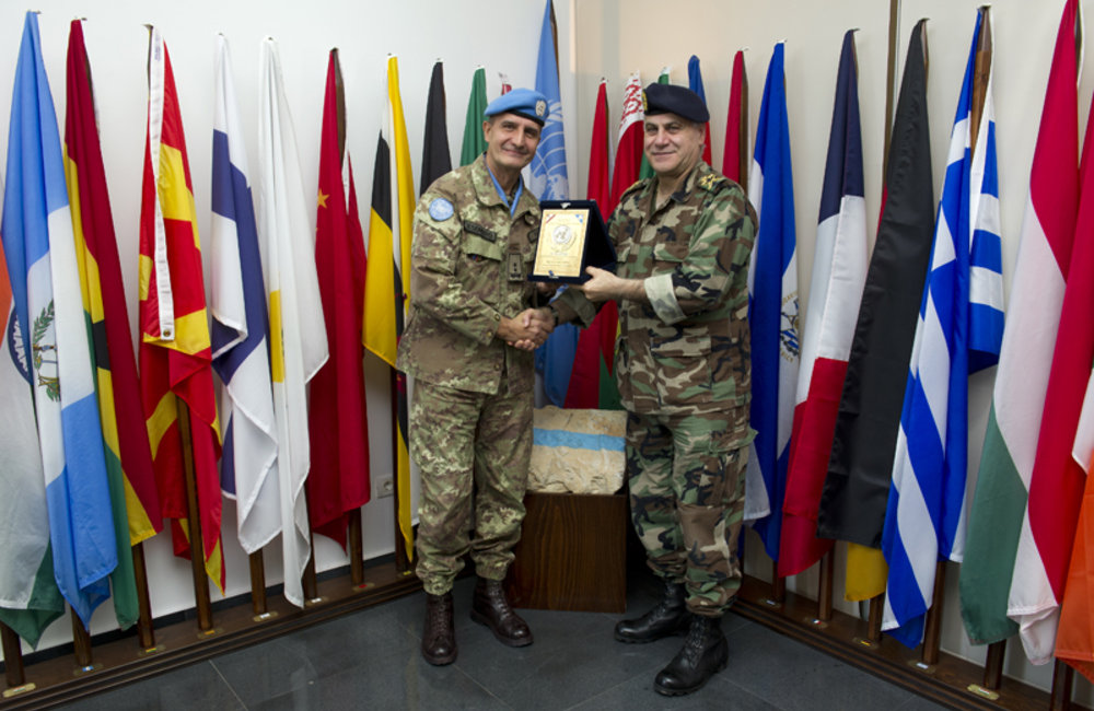 UNIFIL Head of Mission & Force Commander Major-General Paolo Serra presenting a gift to Lebanese Armed Forces General Jean Kahwagi at UNIFIL HQ.