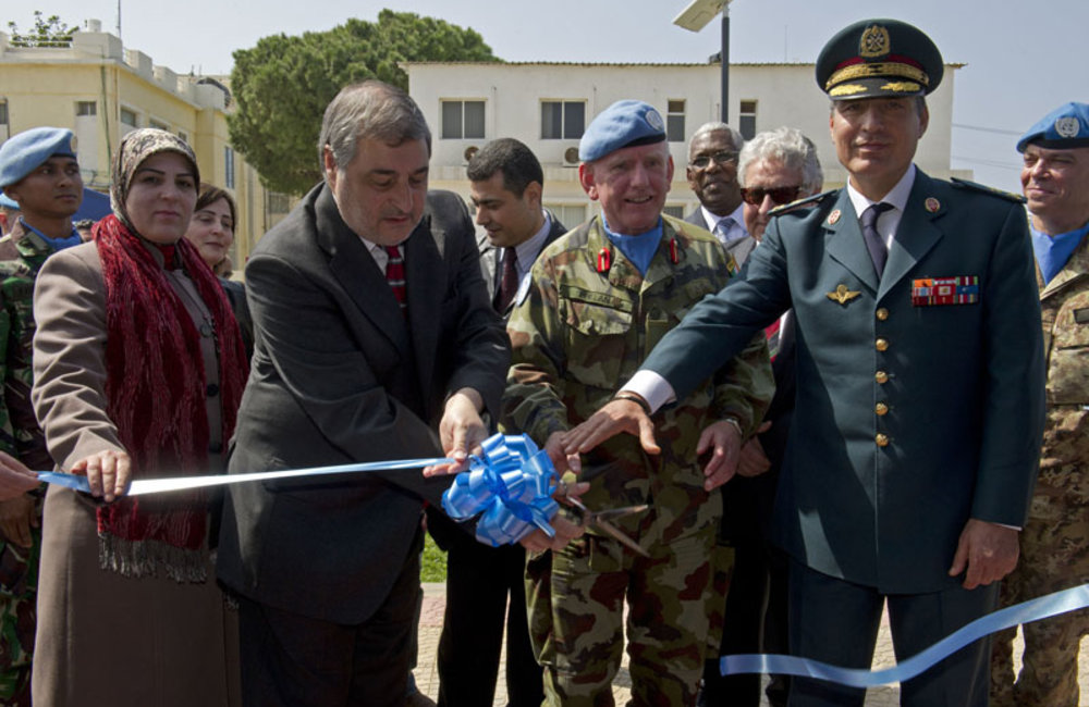 Officer-in-Charge of UNIFIL, Mr. Karen Tchalian (left), LAF Brigadier-General Mohamed Janbay (right) and UNIFIL Acting Force Commander Brigadier-General Patrick Phelan (center) cutting the ribbon during the donation ceremony of technical equipment to local organizations.