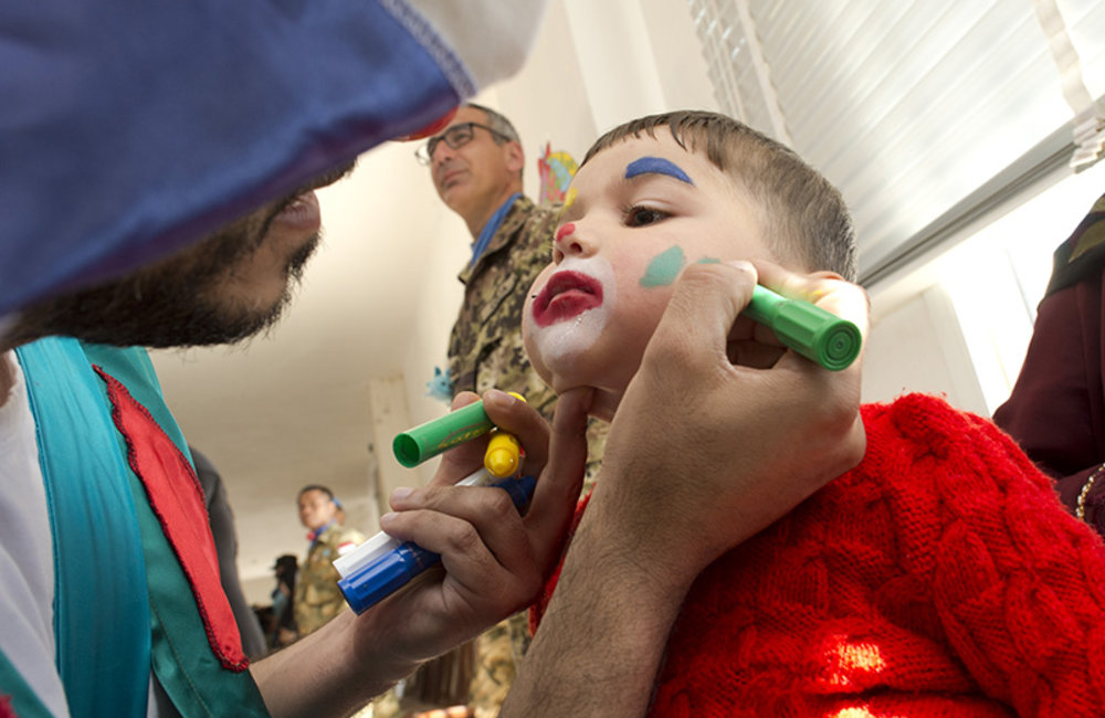 Face painting activity at Ayta Shaab Care Centre for Children with Special Needs during clown therapy event organized by UNIFIL.