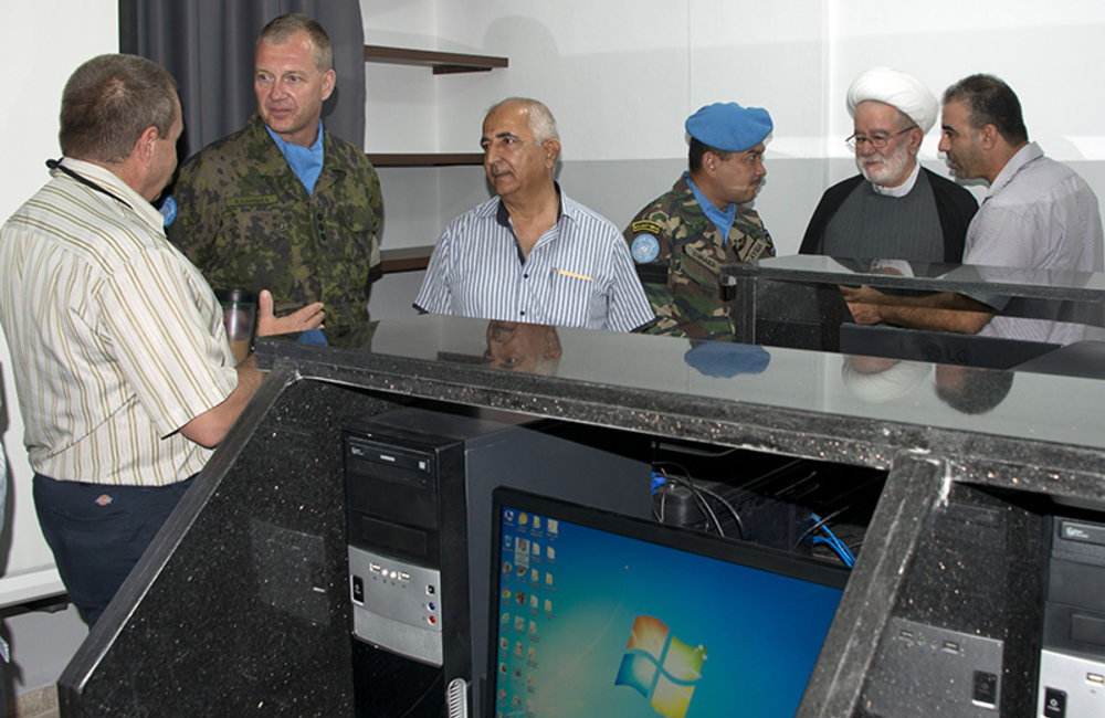 Mr. Nasser al Sabbah, UNIFIL Civil affairs officer, explains to the attendees the importance of the donated equipment.