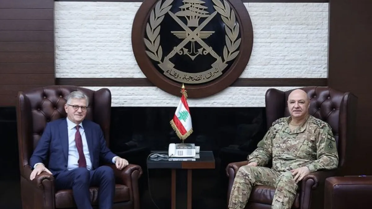 Jean-Pierre Lacroix sits with a peacekeeping representative.