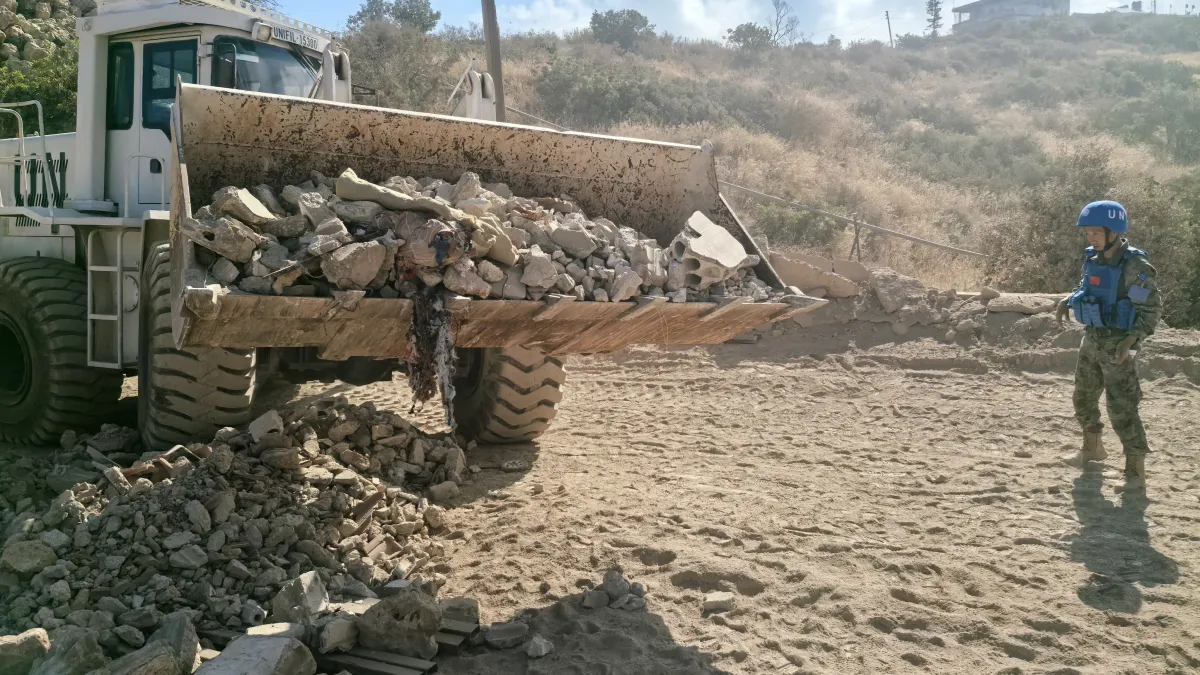 Peacekeepers repair roads and bridges to improve access