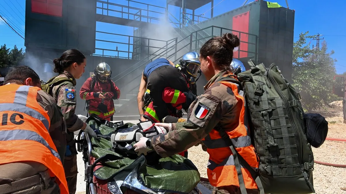 Civil defense firefighters train with French peacekeepers