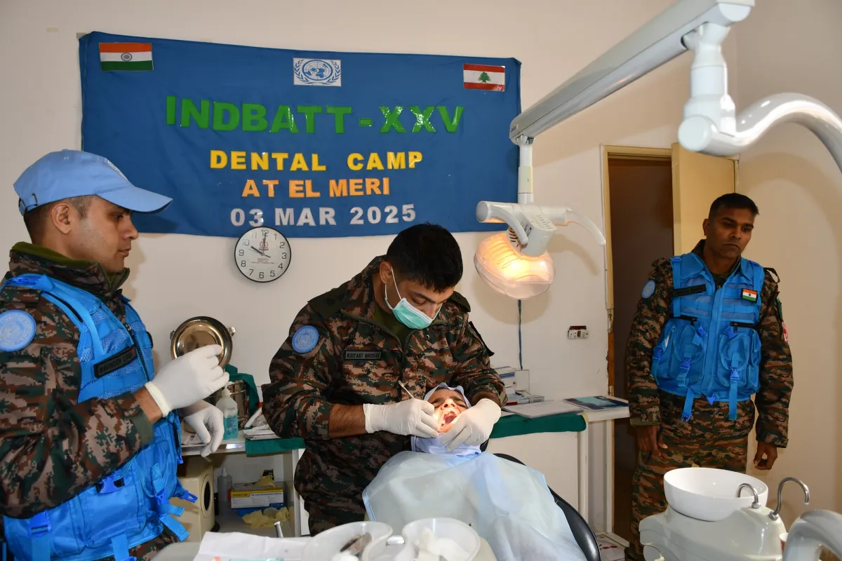 A medical peacekeeper conducting a check up of a dental patient