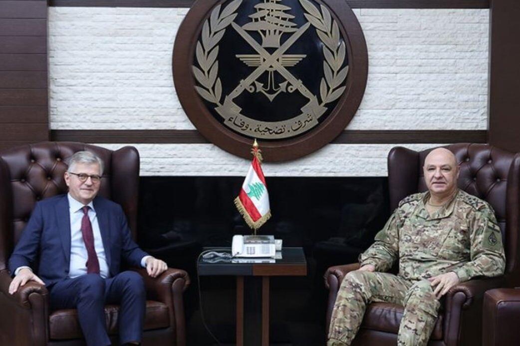 Jean-Pierre Lacroix sits with a peacekeeping representative.
