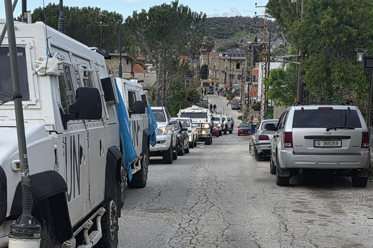 italian peacekeepers escort displaced persons from Debel 1