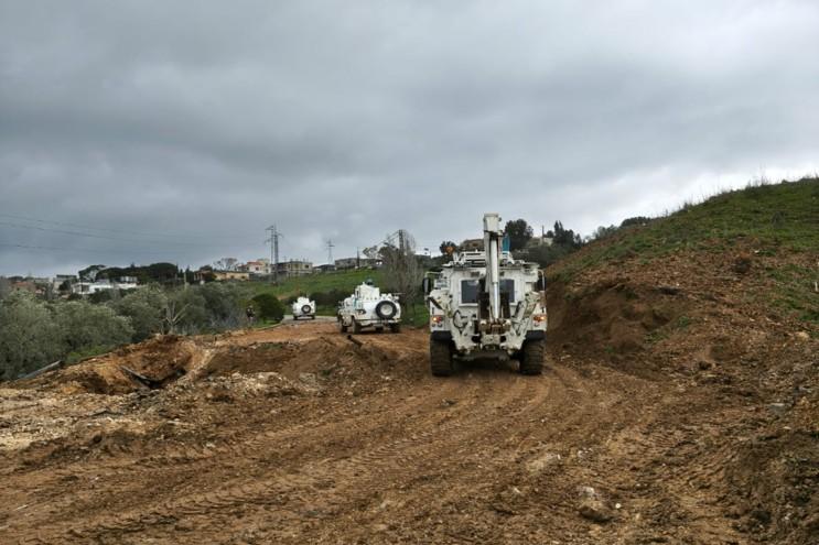 Peacekeepers repair roads and bridges to improve access