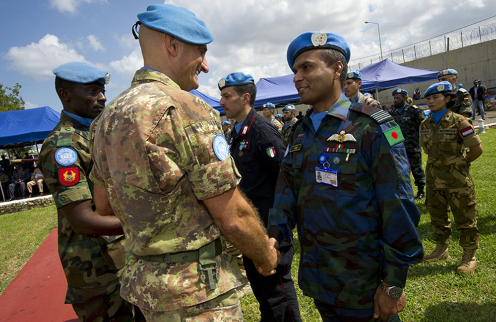 UNIFIL Force Commander Major-General Luciano Portolano awarding medals to peacekeepers during the ceremony held at UNIFIL HQ’s to commemorate International Day of Peace.