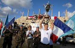 UNIFIL’s Force Commander Reserve (FCR) team captain raises the Military Olympiad Cup - 2017.