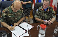Brigadier General Mohammed Janbay of the Lebanese Armed Forces (LAF) signs a receipt of the equipment donated by UNIFIL.