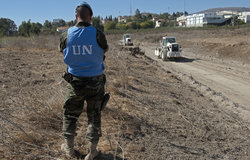UNIFIL Spanish peacekeeper securing the perimeter of the water channel construction site in Kfar Kila, South Lebanon.