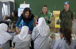 Lebanese-Brazilian recycle art specialist Katia Awar explaining to the students how to turn recycled material into art.