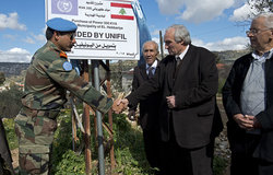 UNIFIL Indian Battalion Commander Colonel Rajesh Dahiya and Qaem Maqam of Hasbaya Mr. Walid Ghafir unveiling a plaque during the handover ceremony in Hebbariyeh.