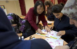 Seiko Hatakeyama, from All-One, a charity NGO engaged in promoting Origami in Lebanon, introduces Origami to teachers from -Ori means fold and gami means paper-.