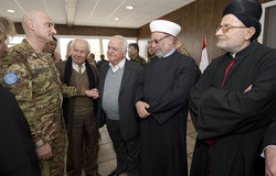 UNIFIL Head of Mission and Force Commander Major-General Luciano Portolano welcoming to the meeting Sheik Hassan Dali (centre) and Archbishop Shukrallah Nabil el Hajj (right)