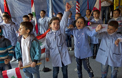 School children performing a song during the event held in Chebaa’s public school.
