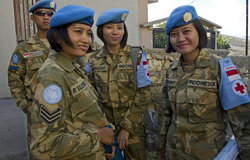Indonesian battalion nursing team on a house call in Rabb Tlettine village.